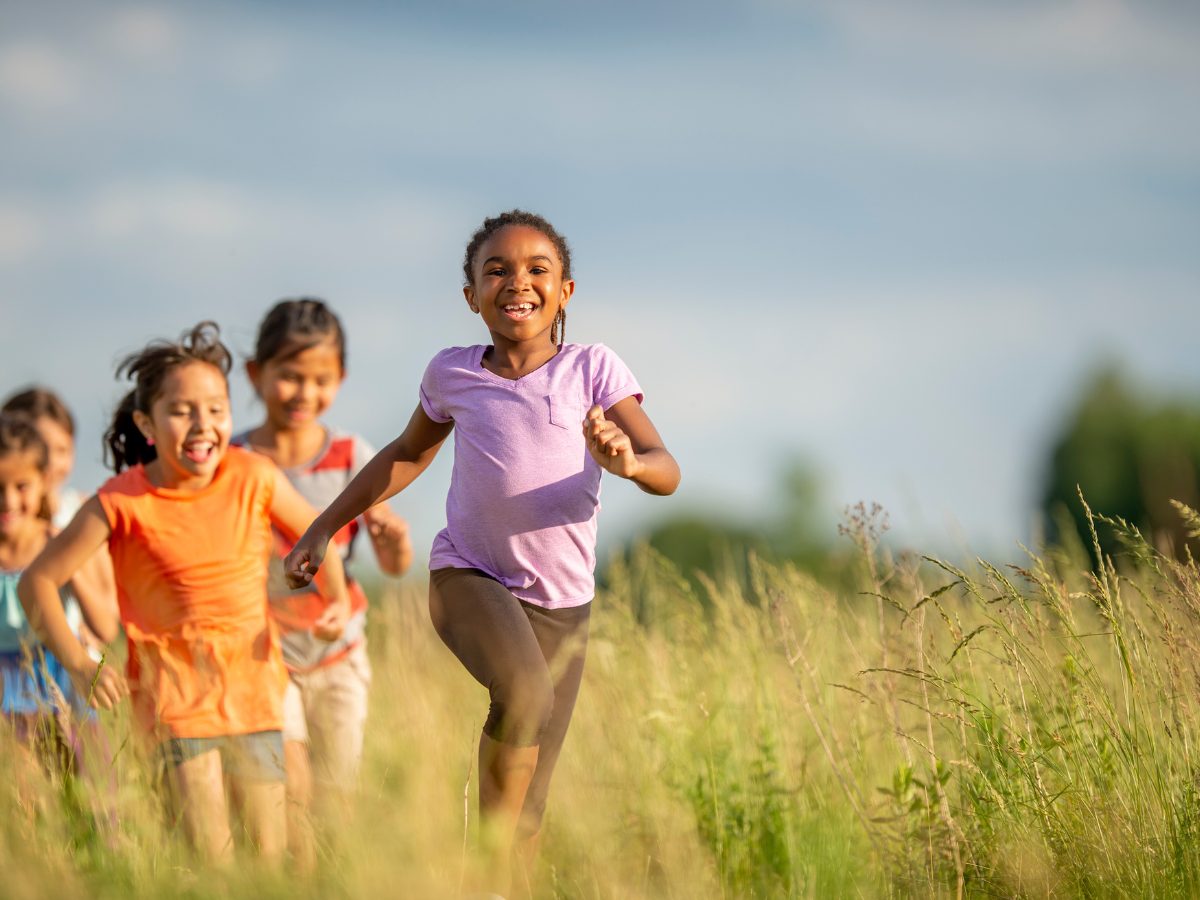 child inclusive mediation blog 2 happy children in a field - child inclusive mediation